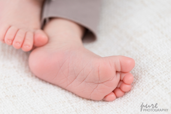 Detailaufnahme Babyfuss, Neugeborenenfotoshooting, Baby Fotoshooting Graz